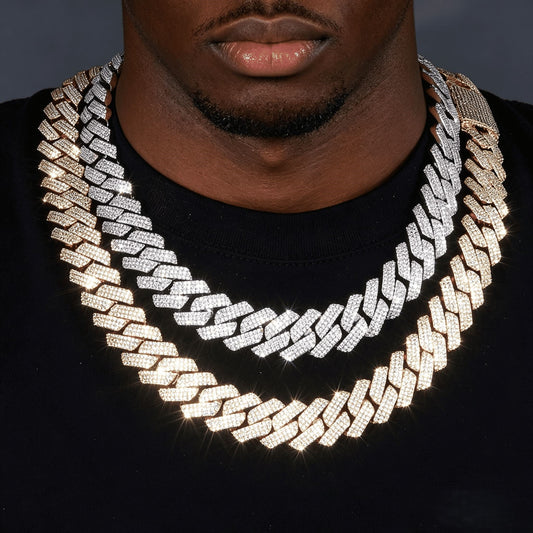 Miami Cuban link chain worn around the neck on a model on a dark textured surface