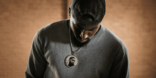 Man wearing a custom picture pendant, showing why a clear photo upload matters before ordering personalized jewelry.