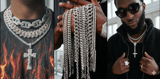  A neck view shows multi-layered diamond tennis and Cuban link chainswith a large lcegrind Jesus cross pendant over a black flame-patterned t-shirt.