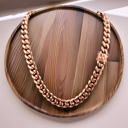 Curved 14MM rose gold Miami Cuban link chain laid