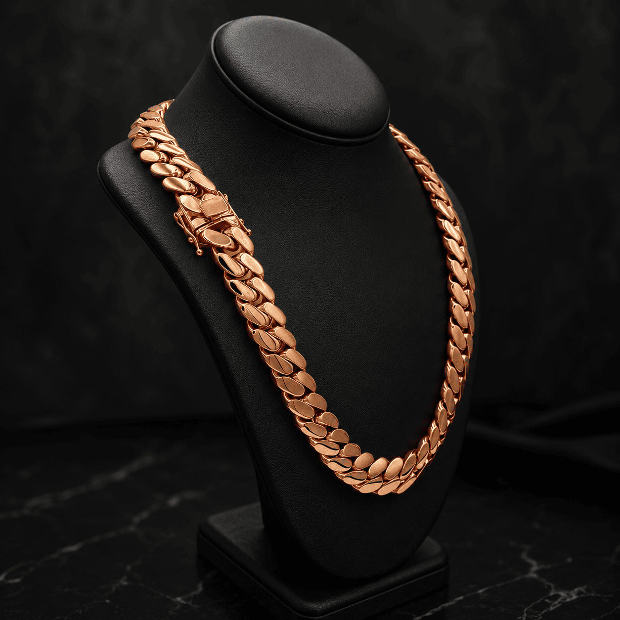 16MM rose gold Miami Cuban link chain displayed on a black mannequin