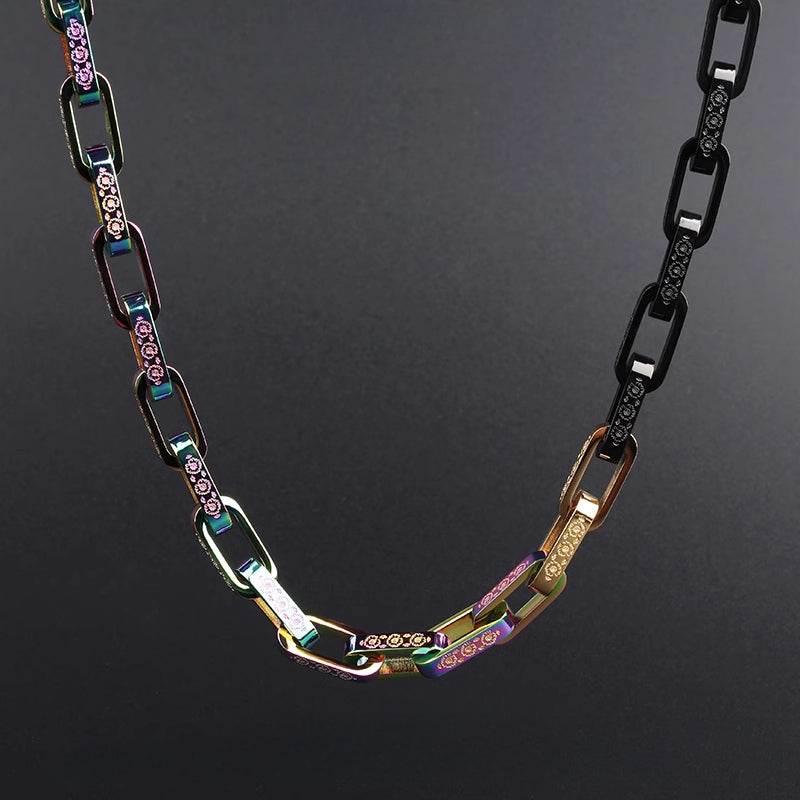 Curved chain hanging against a solid dark background