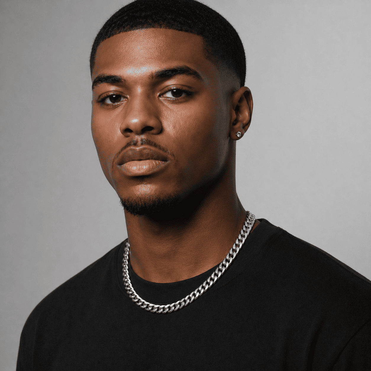 Close up portrait featuring the IceGrind 8mm White Gold Miami Cuban Link Chain. Elevate your look with this 8mm cuban link miami chain.