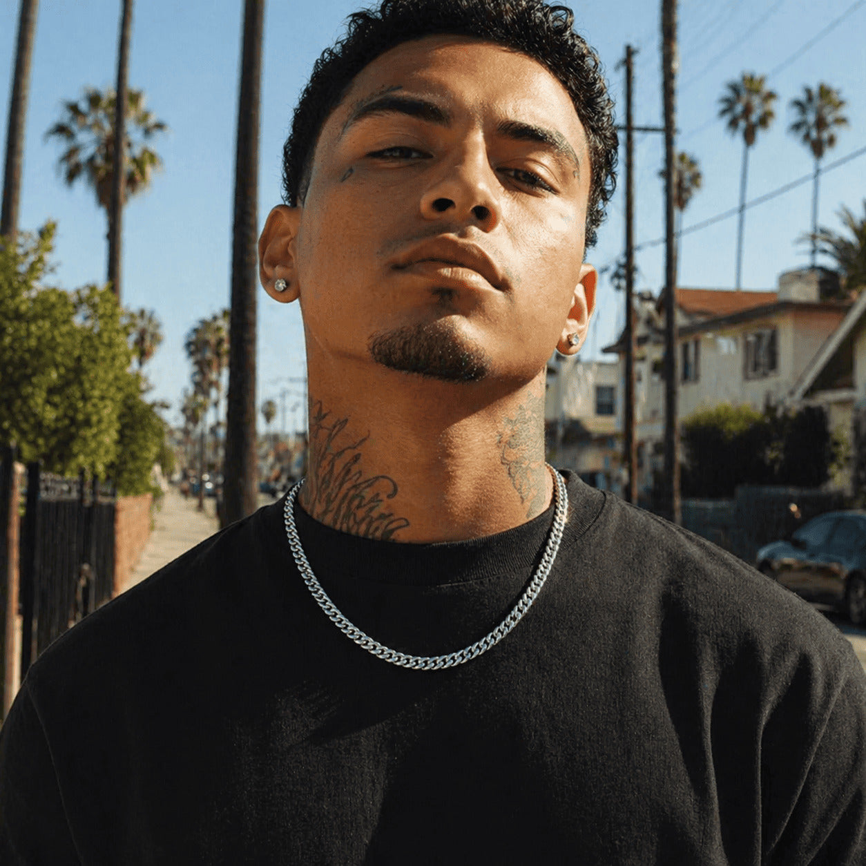 Man wearing the icegrind 6mm White Gold Miami Cuban Link Chain. Streetwear style featuring a sleek cuban link miami chain.