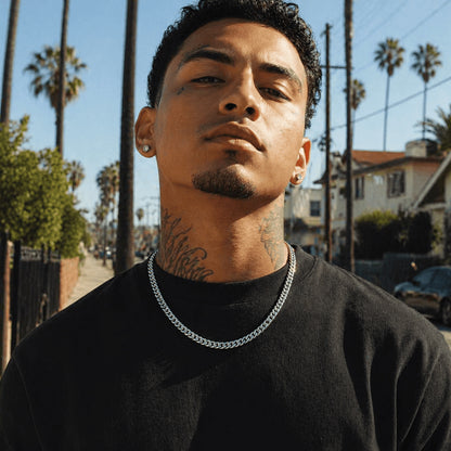 Man wearing the icegrind 6mm White Gold Miami Cuban Link Chain. Streetwear style featuring a sleek cuban link miami chain.