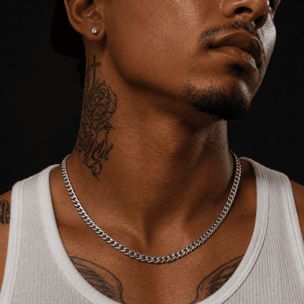 Close up of a model wearing an icegrind 6mm White Gold Miami Cuban Link Chain. Classic white gold cuban link miami chain.