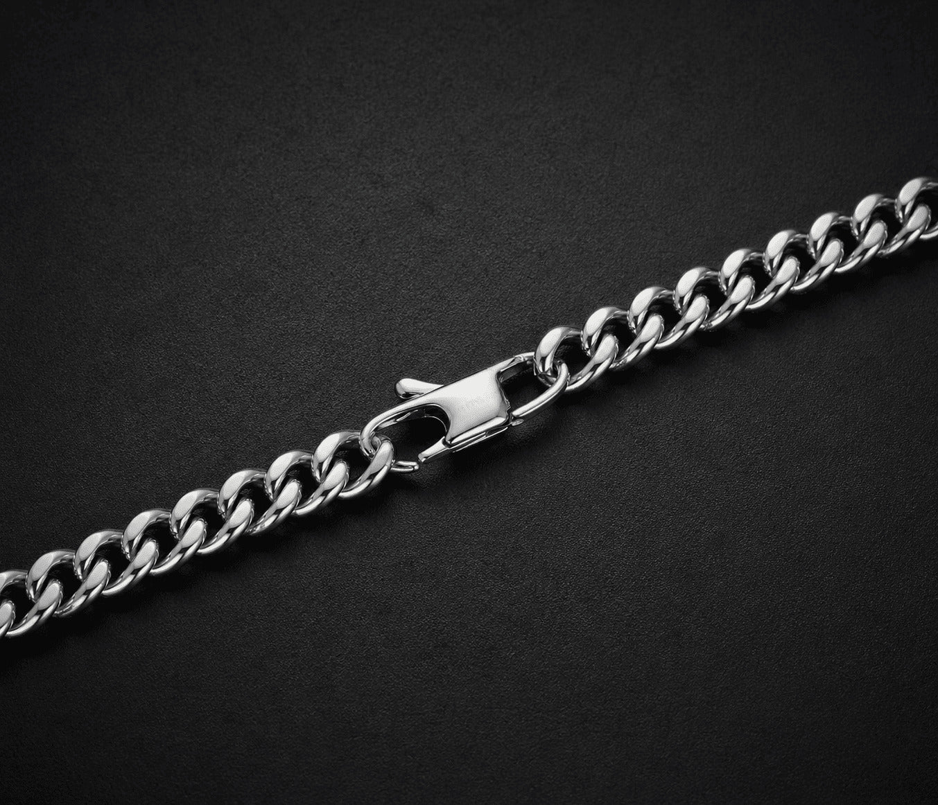 Secure clasp detail on the 6mm White Gold Miami Cuban Link Chain by icegrind. Durable hardware for your cuban link miami chain.