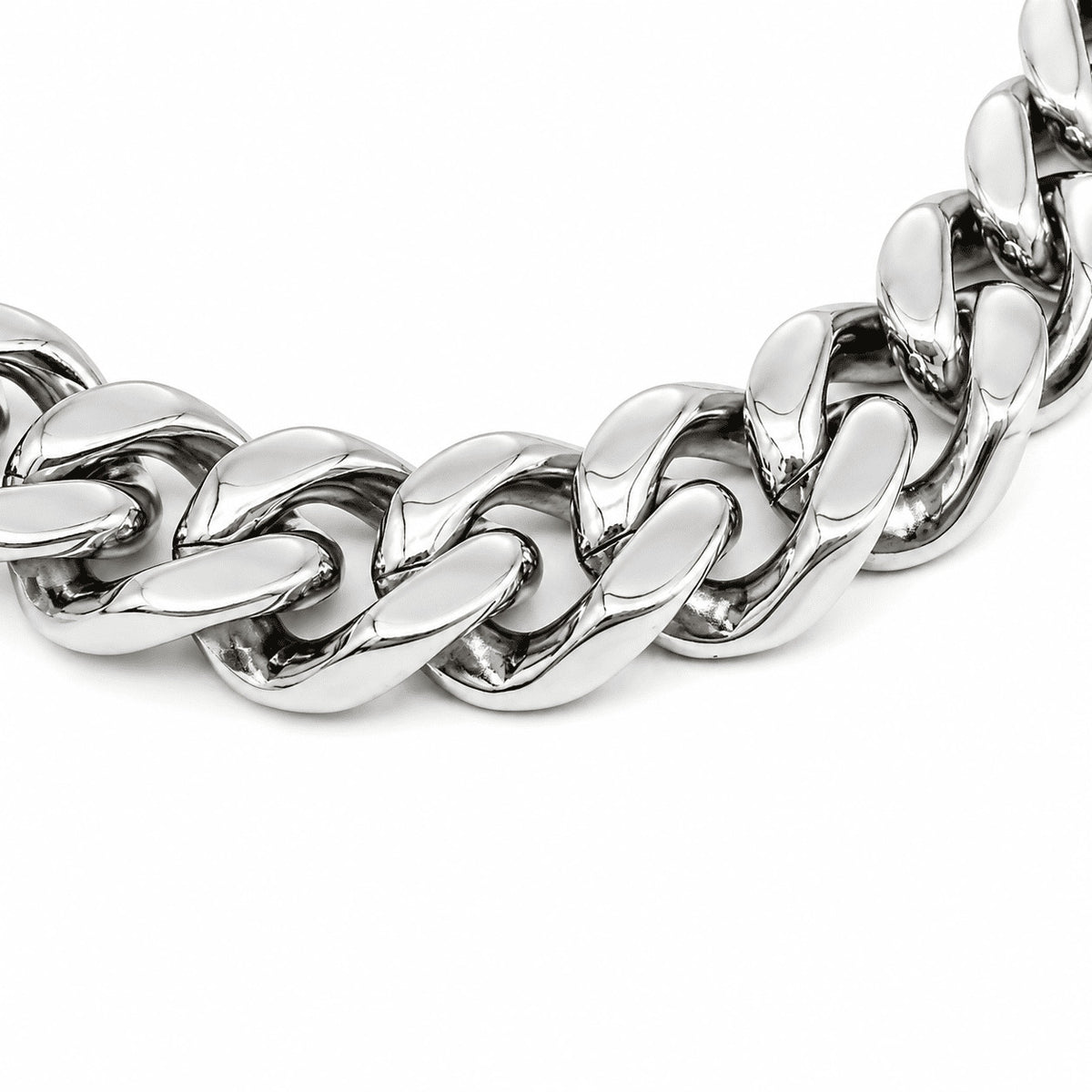 Close-up of white gold Miami Cuban link chain links laid flat against a white background