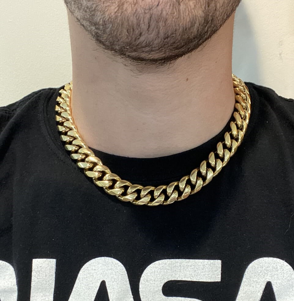 16MM gold Miami Cuban link chain worn around the neck