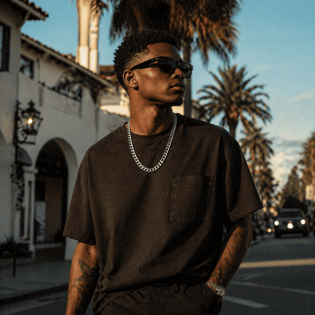 Urban luxury style in the sun featuring the IceGrind 12mm White Gold Miami Cuban Link Chain. A colossal streetwear cuban link miami chain.