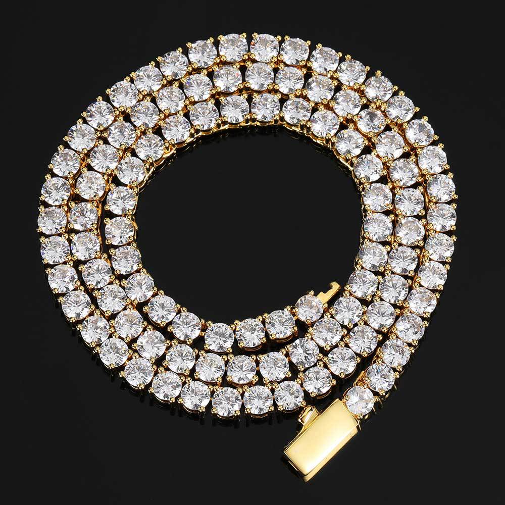 Coiled gold tennis chain with its box clasp visible