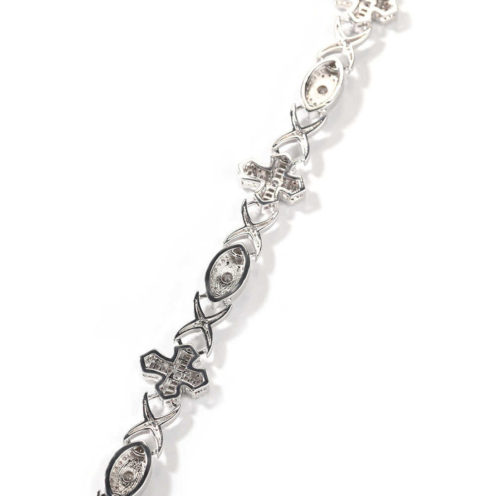 Linear 14MM white gold iced out evil eye cross link chain link detail with box clasp detail against a white background