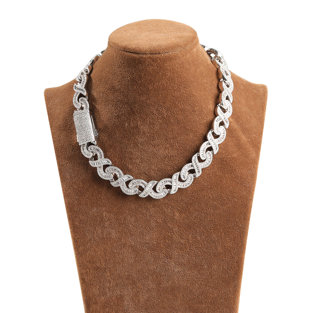 15MM white gold Cuban link chain displayed on a black mannequin