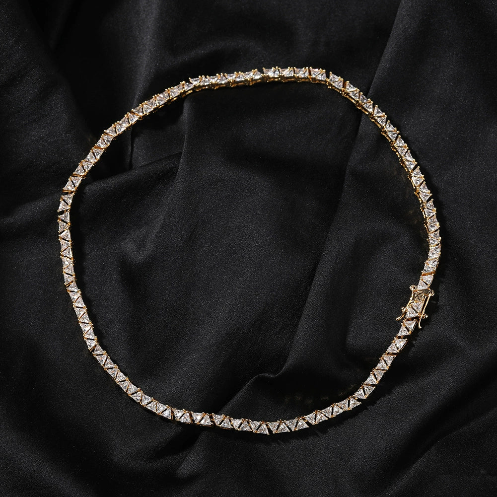 5MM gold pyramid tennis chain displayed in a circular loop with its clasp visible
