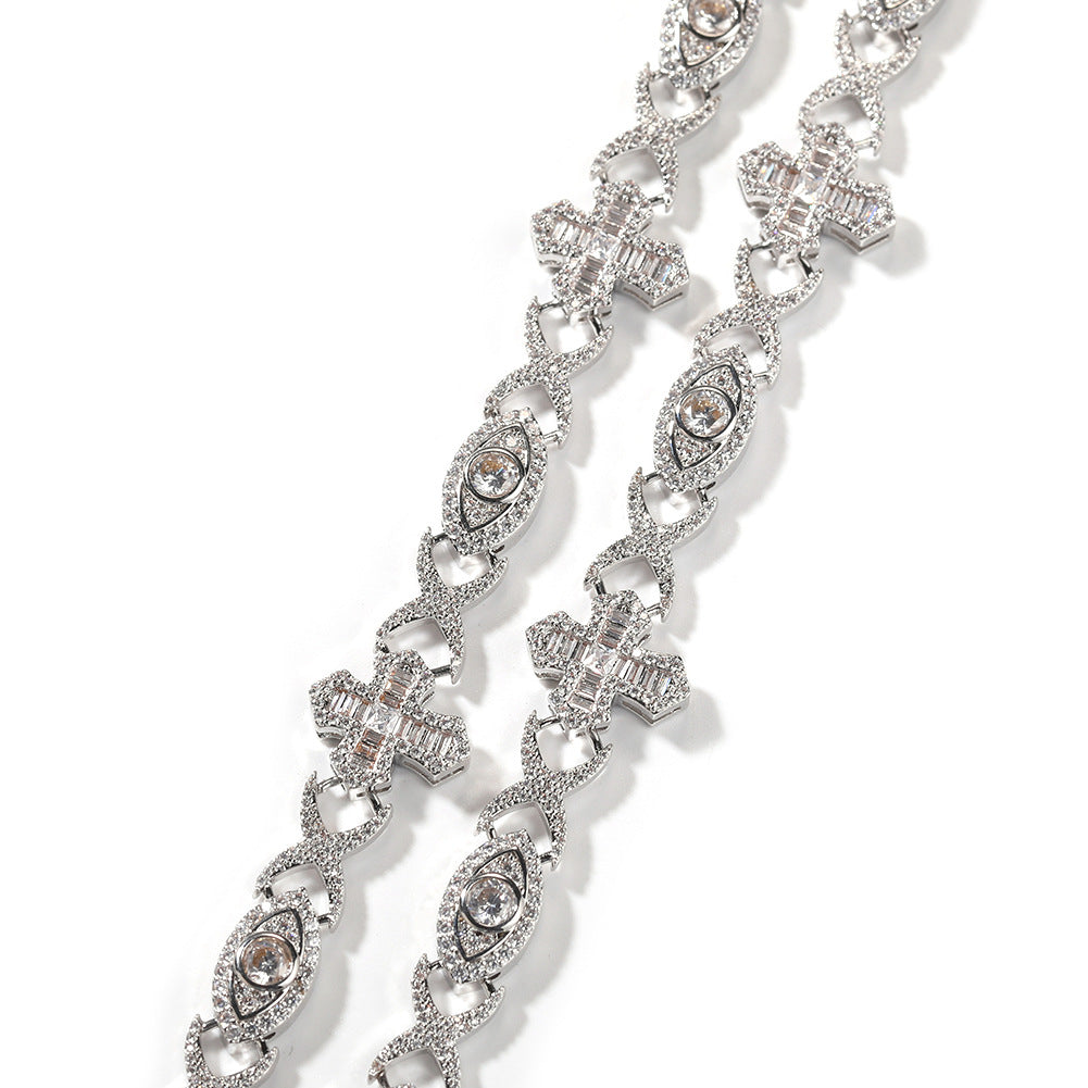 14MM white gold iced out evil eye cross link chain links laid out in parallel against a white background