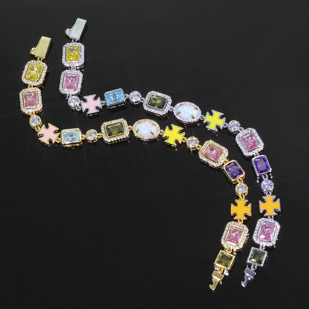 Curved 10MM gold cross link chain layout with enamel crosses and varied gemstone colors