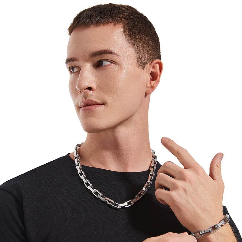 white gold chain and matching bracelet styled on a model