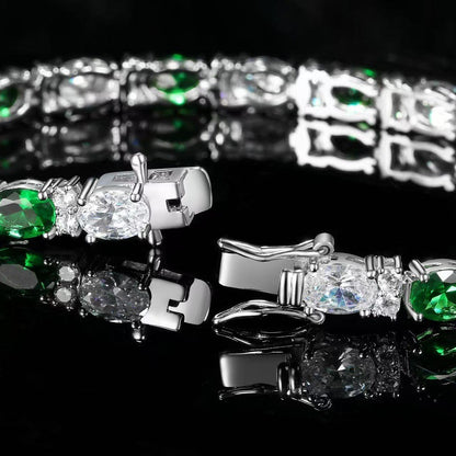 5MM White Gold Tennis Bracelet - Emerald & Clear Oval Stones