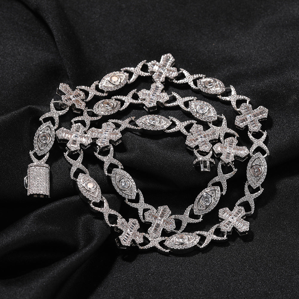 Coiled 14MM white gold iced out evil eye cross link chain with its box clasp visible