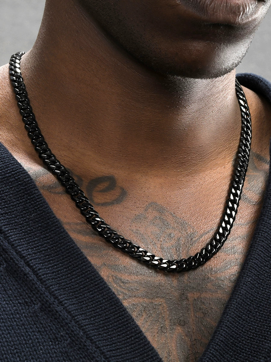 8MM black Cuban link chain worn around the neck on a model for fit and style