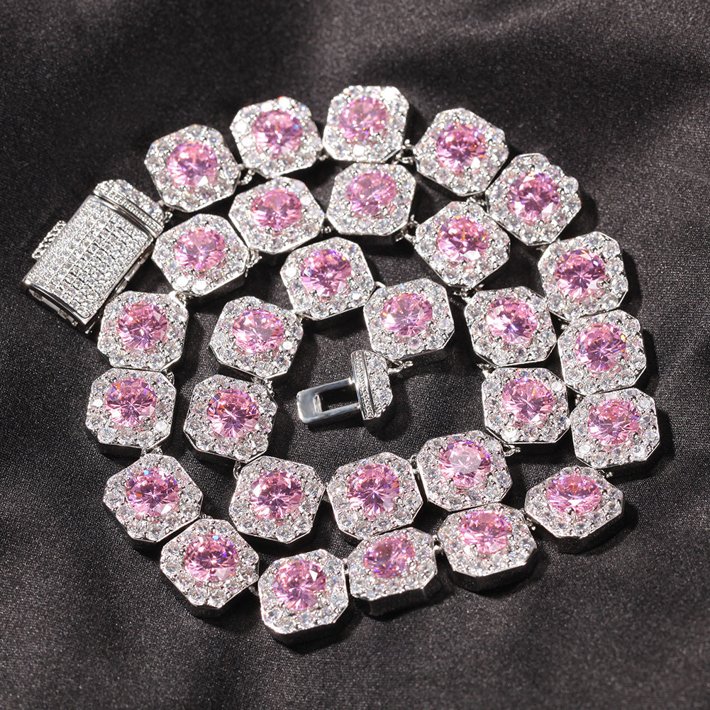 Coiled 12MM pink tennis chain with its box clasp visible