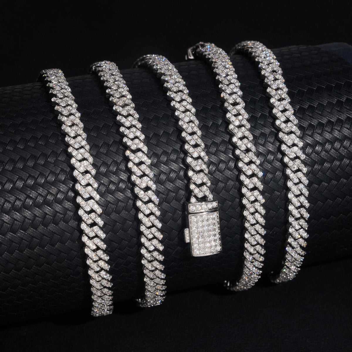 Five 5MM moissanite Cuban link chains arranged in parallel