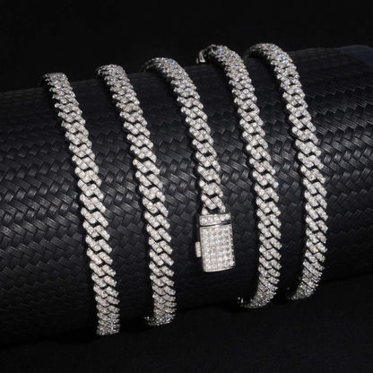 Five 5MM moissanite Cuban link chains arranged in parallel