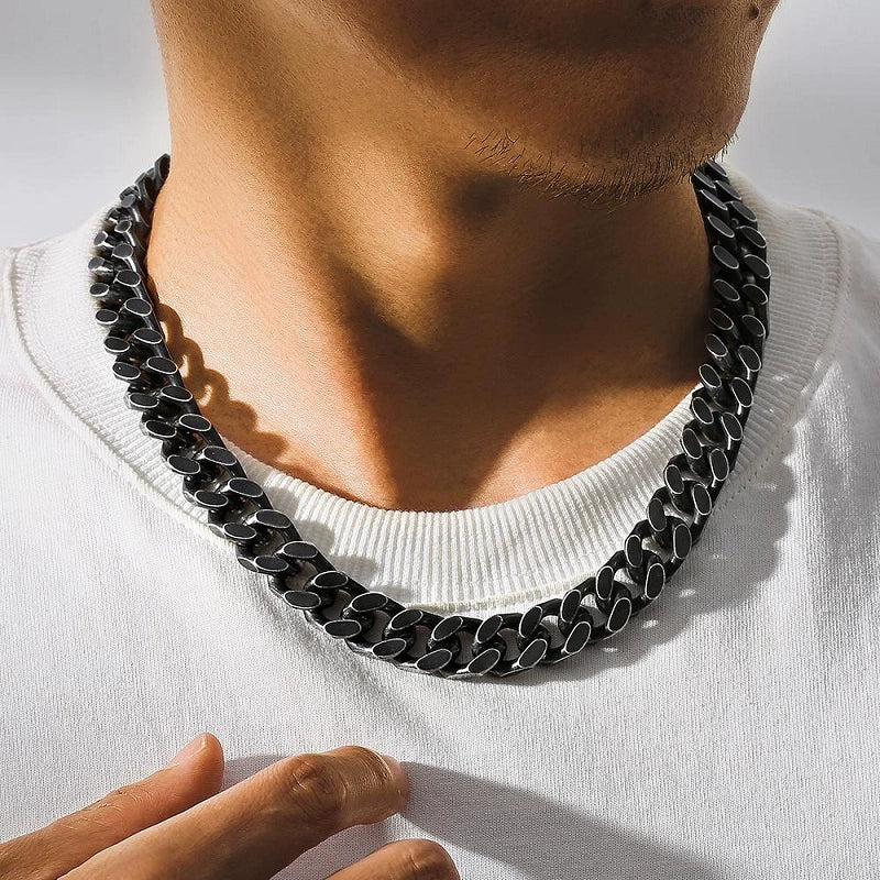 12MM black Cuban link chain worn around the neck
