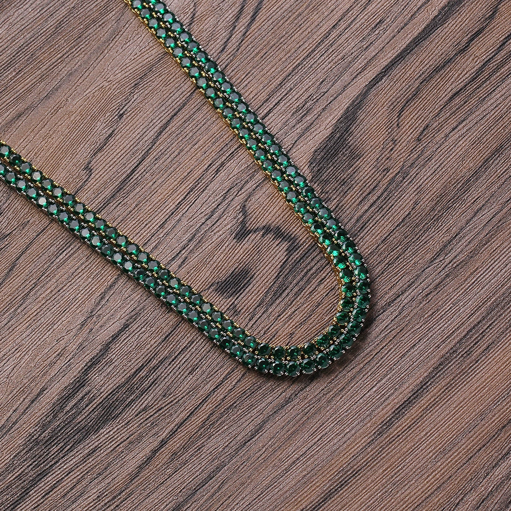 Curved tennis chain laid on a wooden surface