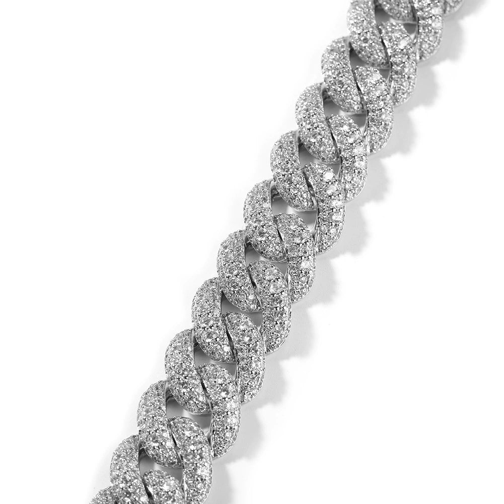 Angled 18MM white gold Cuban link chain on a white background showing iced link sparkle