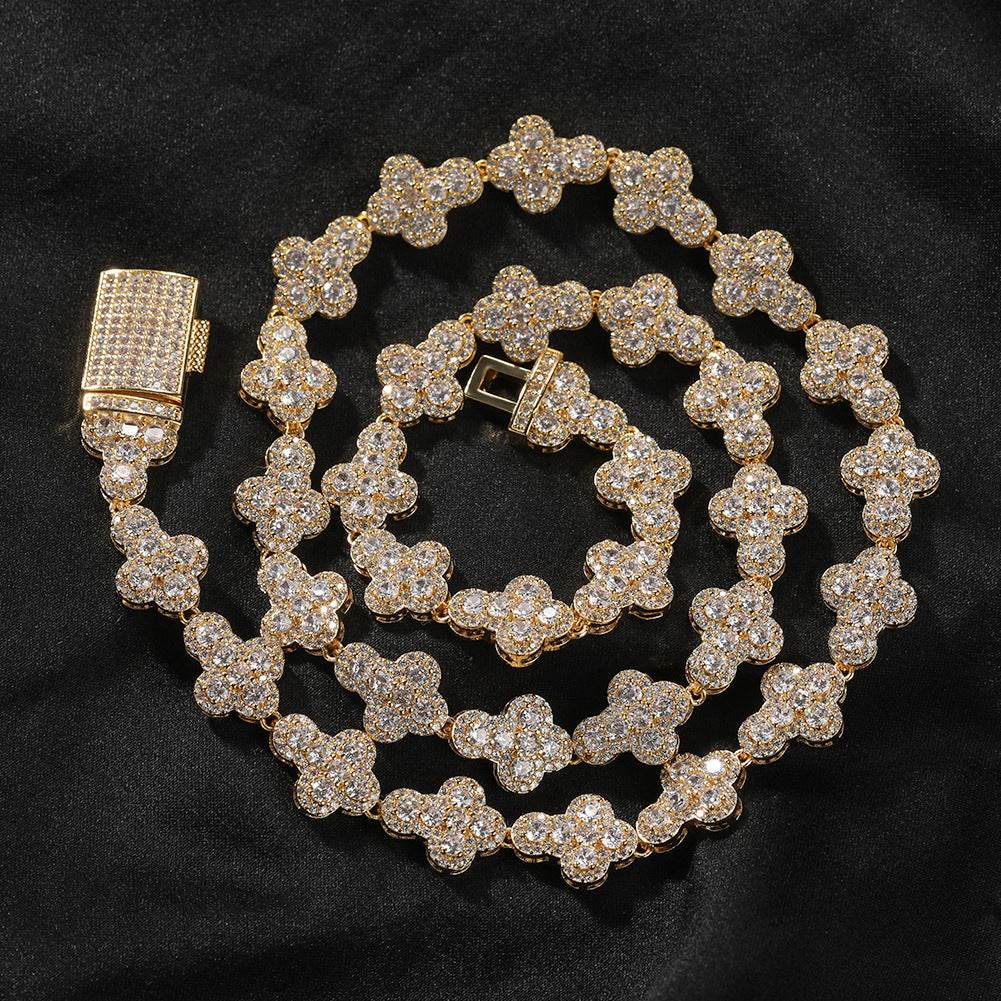Coiled 10MM gold cross link chain with its box clasp visible