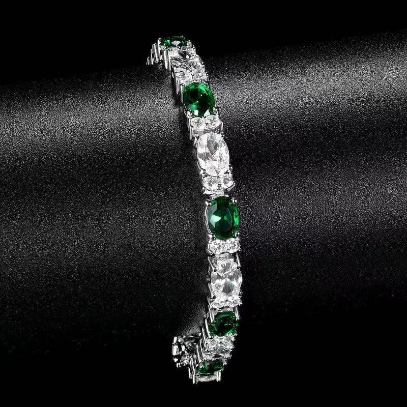 5MM White Gold Tennis Bracelet - Emerald & Clear Oval Stones