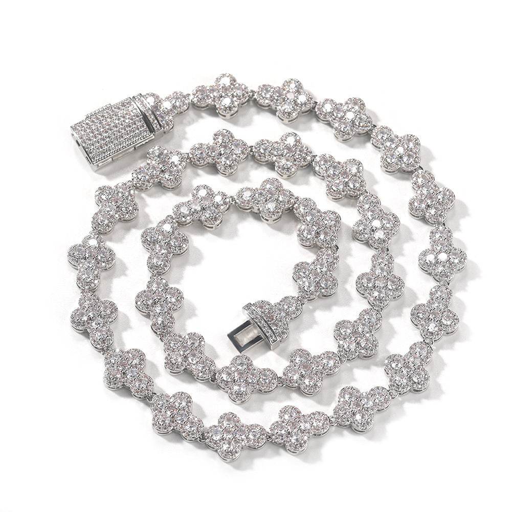 Coiled 10MM white gold cross link chain against a white background with its box clasp visible