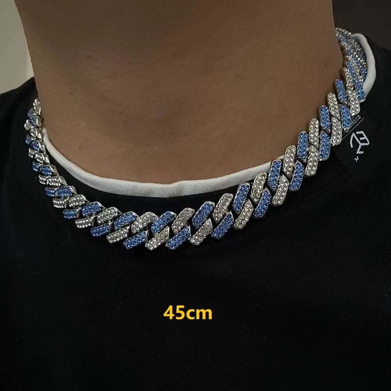 13MM white gold Cuban link chain worn over a black shirt with a white collar and visible 45cm text