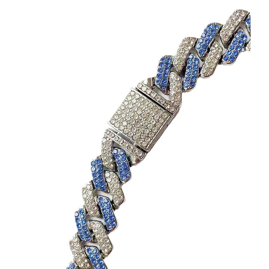 Angled 13MM white gold Cuban link chain displayed against a white background