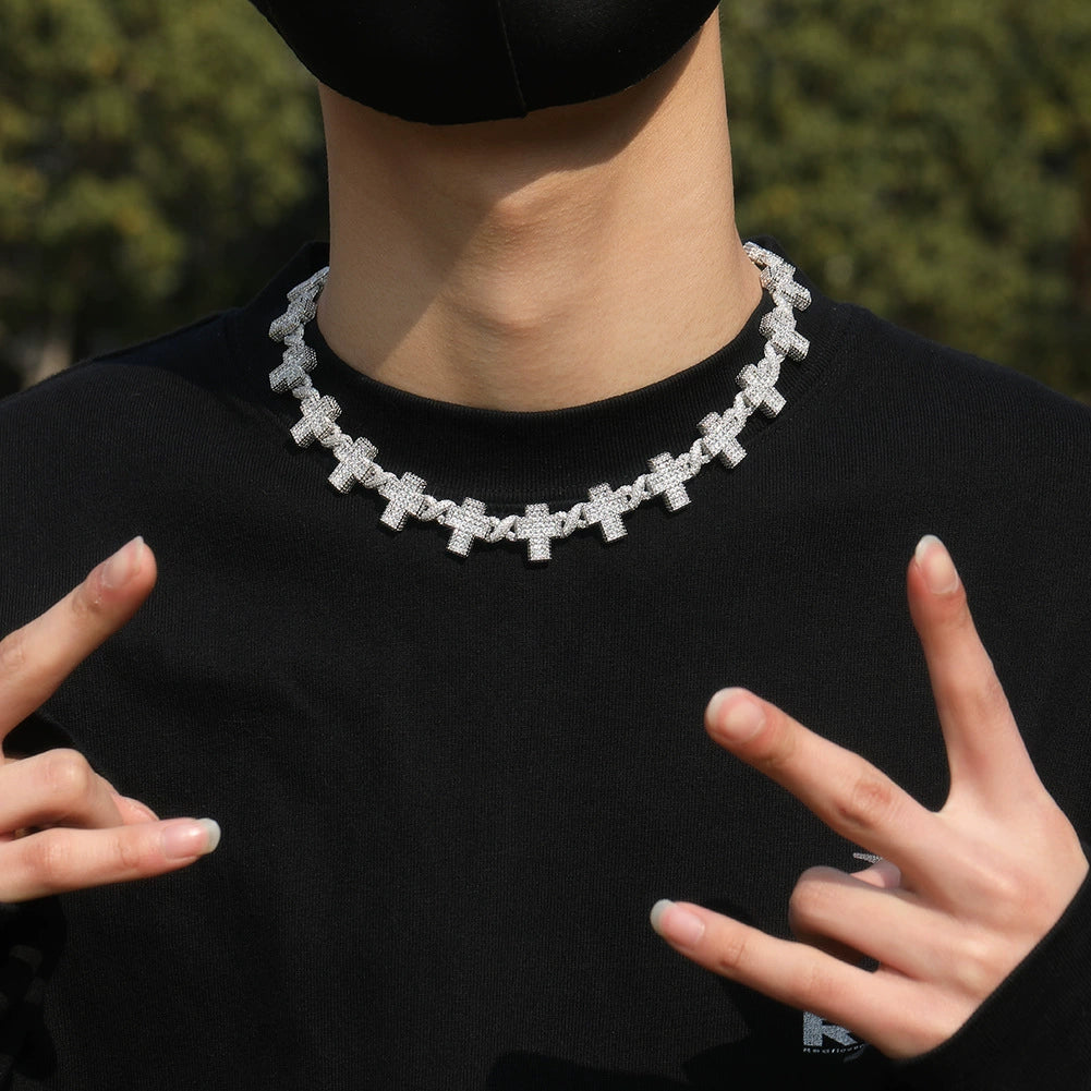chain worn around the neck on a model with chain links visible