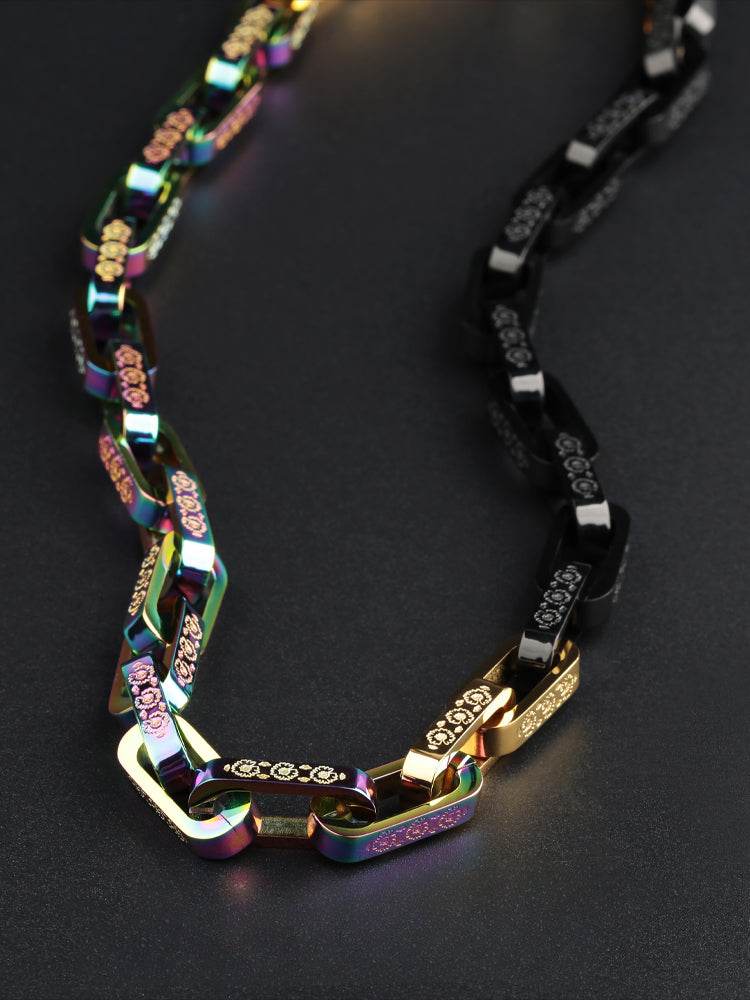 Curved chain laid on a dark textured surface