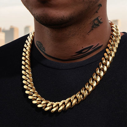14MM gold Miami Cuban link chain worn around the neck