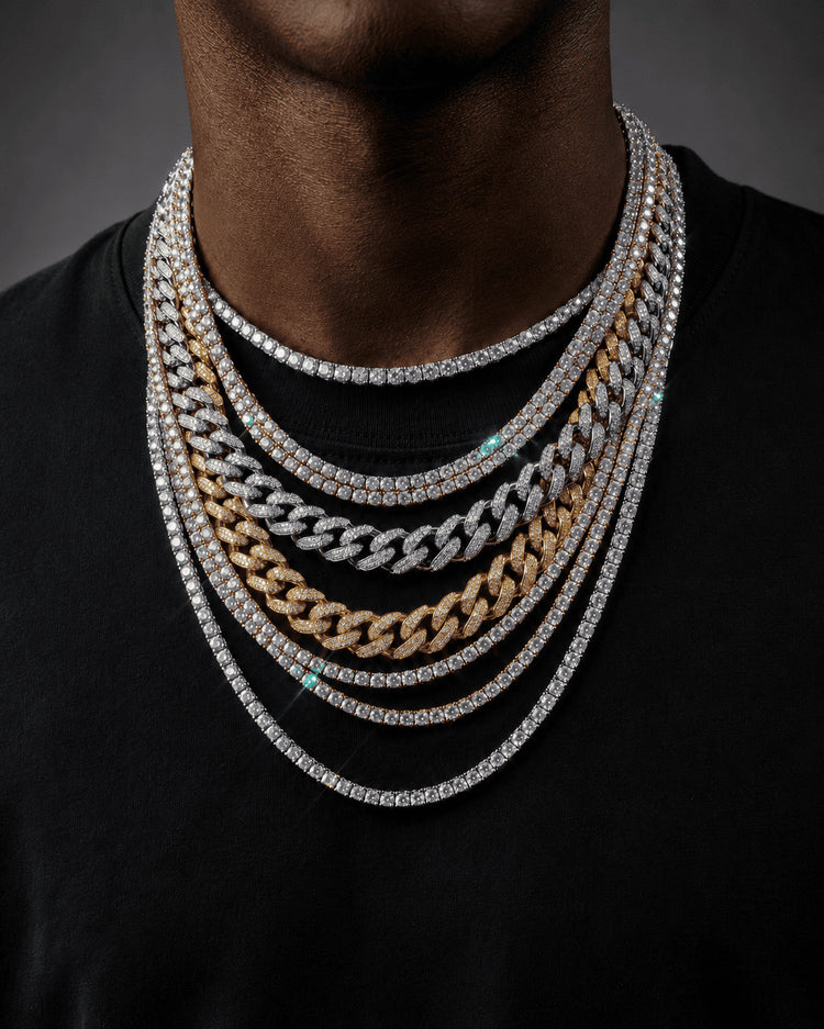 IceGrind men’s chain close-up with layered Cuban link chains and diamond tennis chains on a Black male model