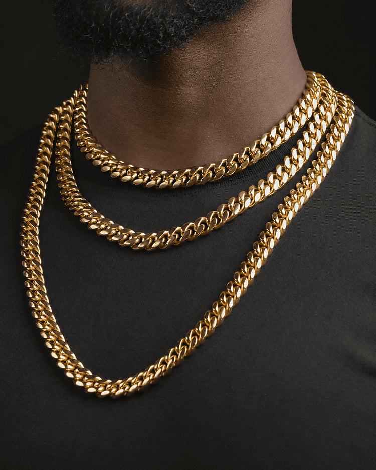 IceGrind Miami Cuban link chain close-up with polished gold Cuban links on a Black male model